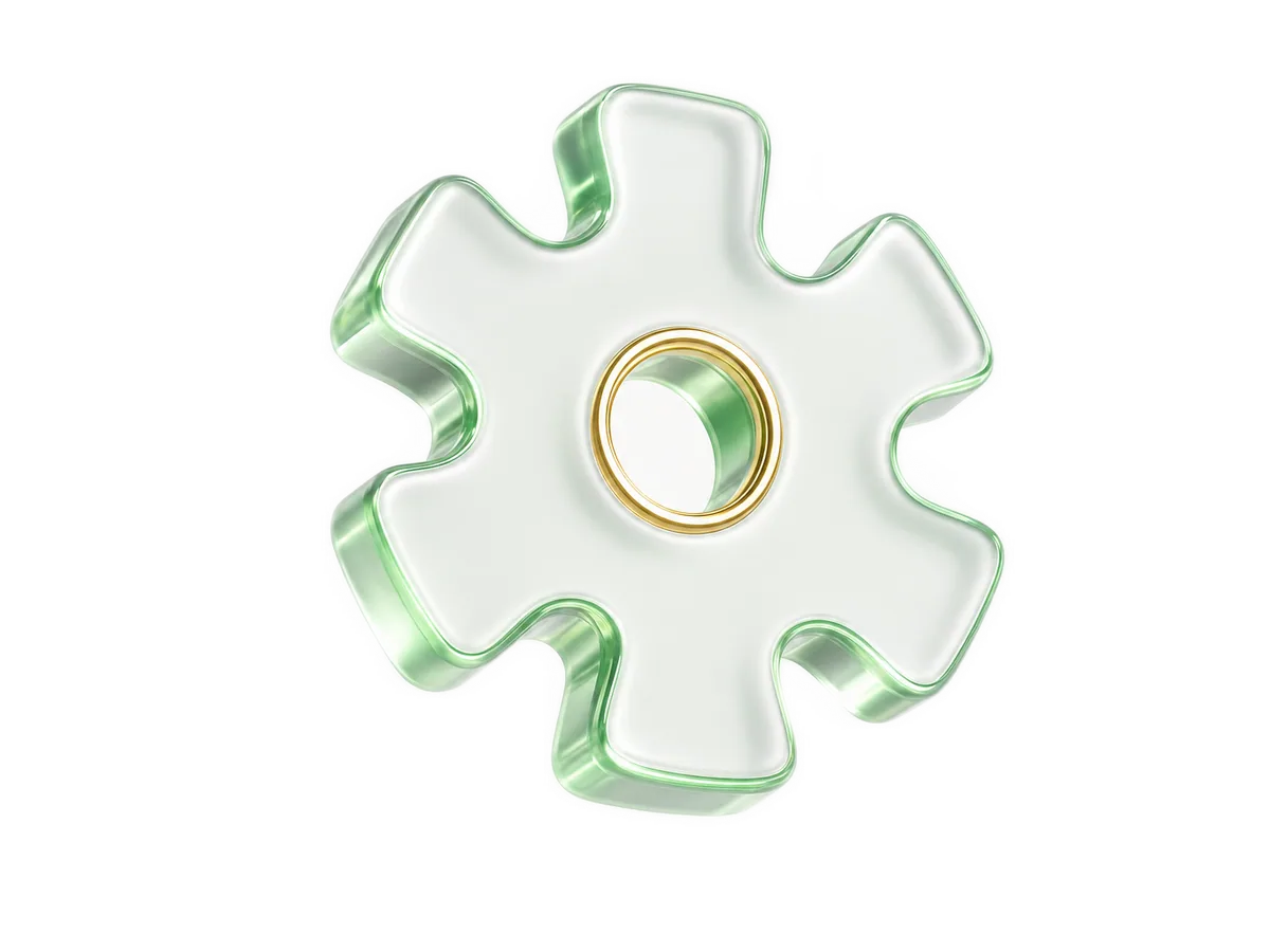 A rounded cog wheel rendered in green translucent glass with gold accents