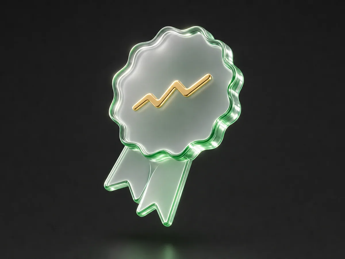 A rounded award seal with a ribbon rendered in green translucent glass with gold accents